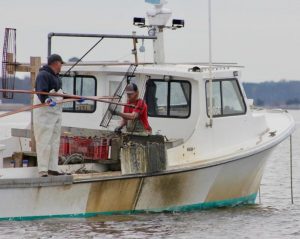 Hand tongers work the Deep Neck Bar in Broad Creek last winter